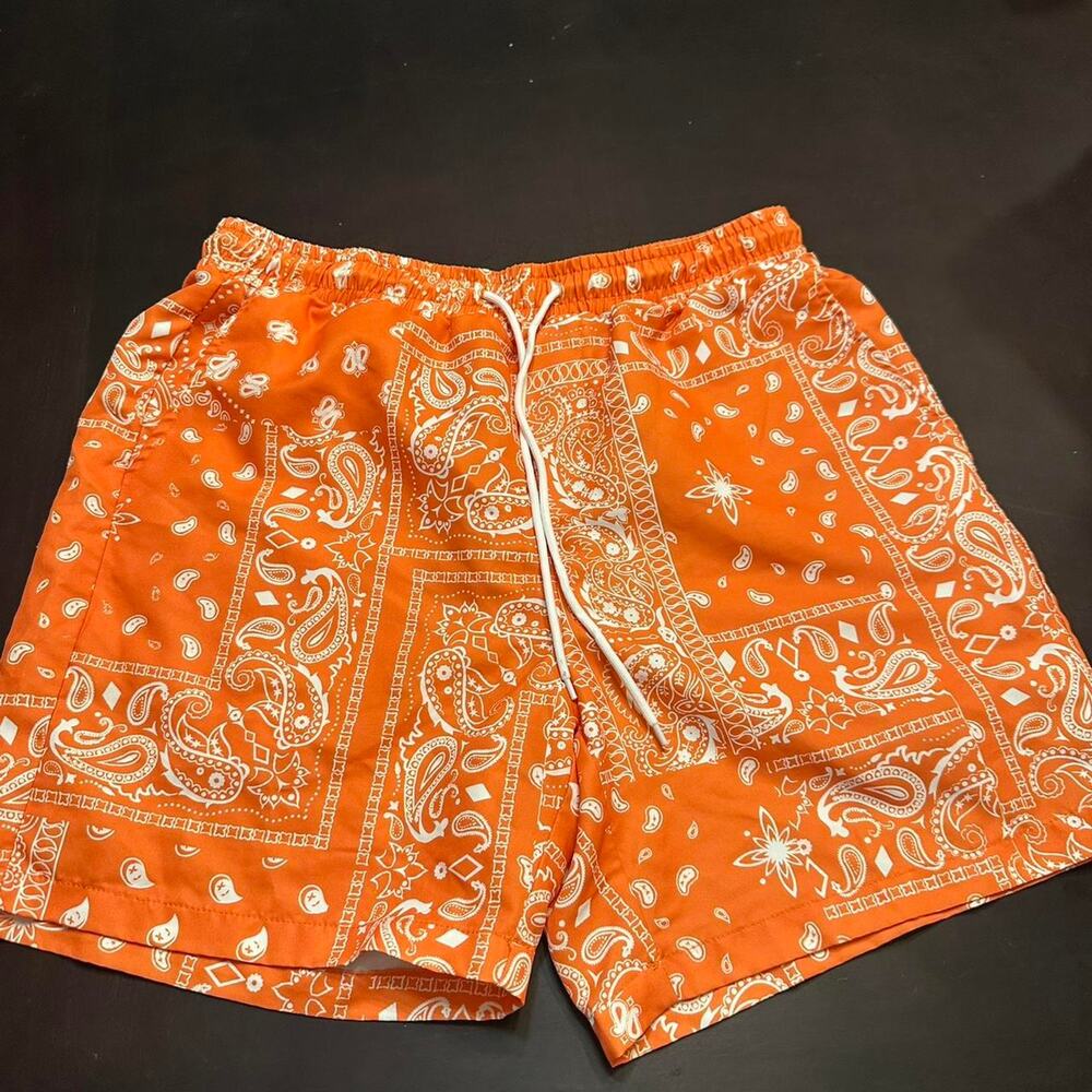 Orange bandana print shorts with